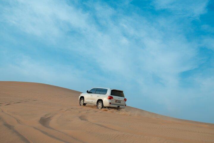 Evening Desert Safari Abu Dhabi with Dune Bashing & BBQ Dinner