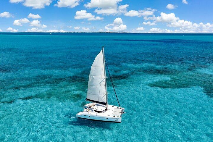 Afternoon Catamaran to Isla Mujeres: Snorkel, Open Bar & Sunset