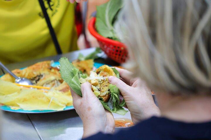 Saigon Night Street Food and City Tour on Scooter