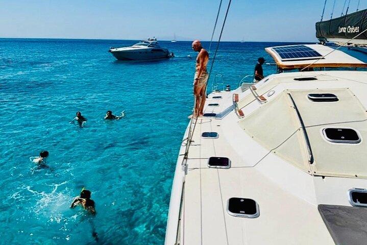 Mykonos Catamaran Cruise Private Tour with Meals and Drinks