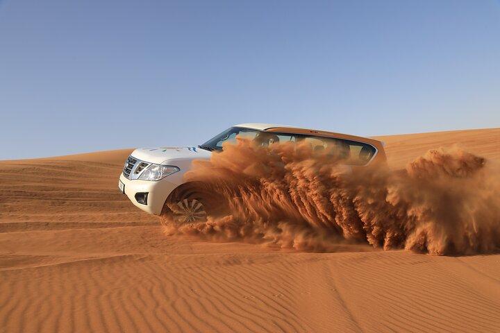 Dubai Desert Safari with BBQ, Camel Ride, Sand Board, Live Shows