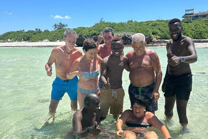 Full-Day Safari Blue Tour with Snorkeling Dolphins & Island Stop