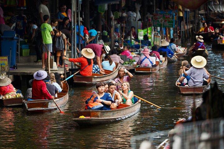 Maeklong Railway & Damnoen Saduak Floating Market Half-Day Tour