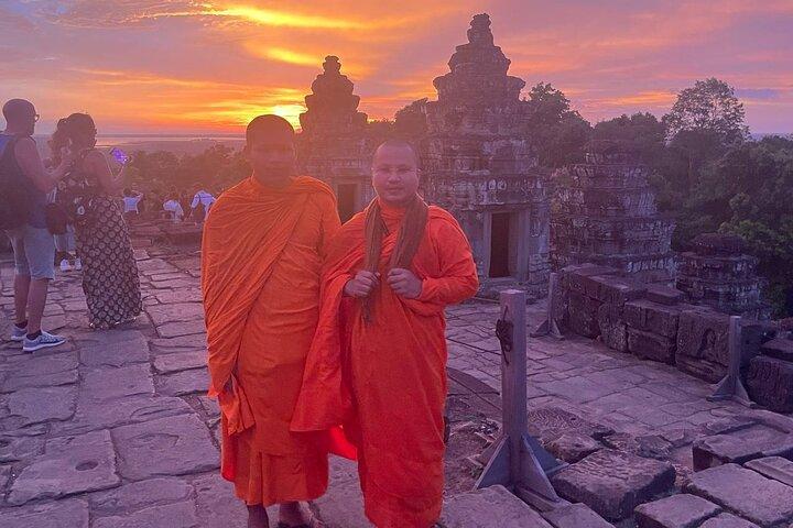 Exploring the Ancient Wonders of Angkor Wat with sunset backheng