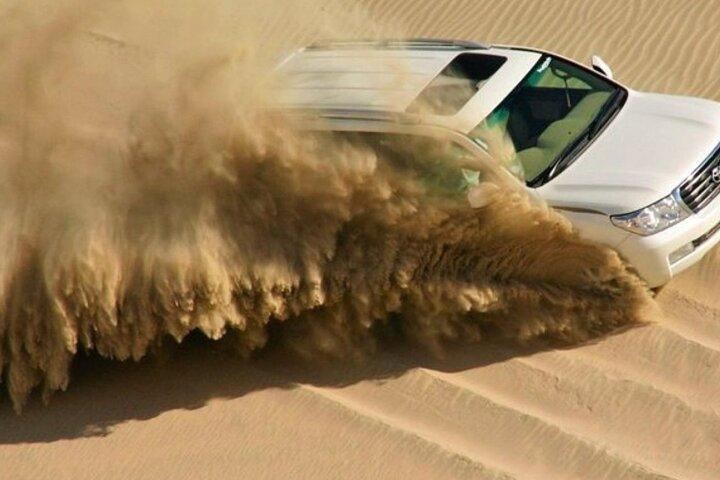 Doha Private Dune Bashing, Camel Ride & Sandboarding & Inland Sea