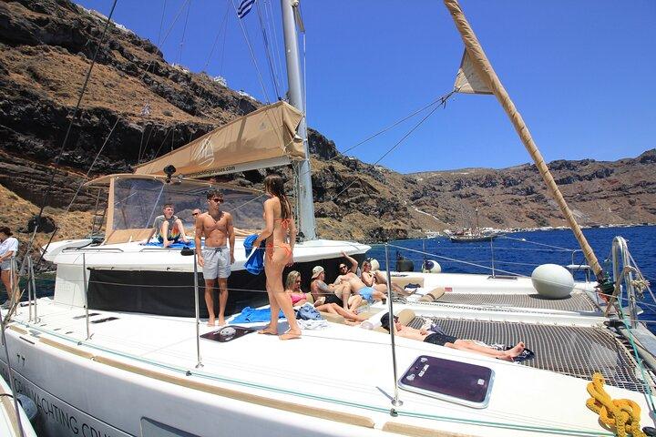 Luxury Santorini Catamaran Cruise: Lunch, BBQ, Drinks, Transfers