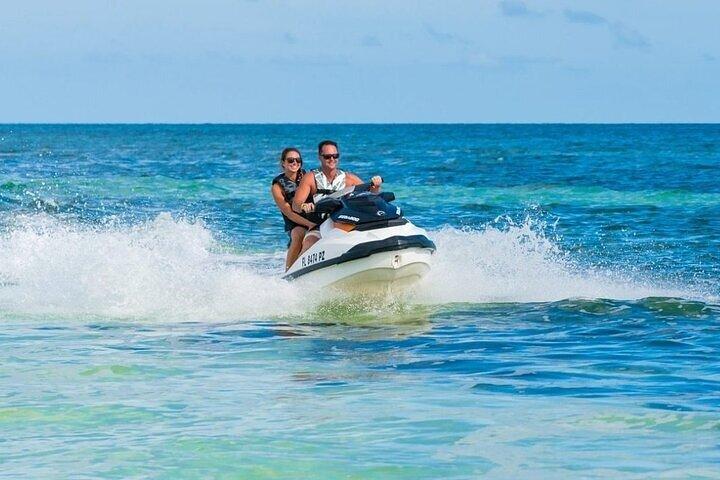 Jetski and Parasailing w/ Entry & Private Transportation