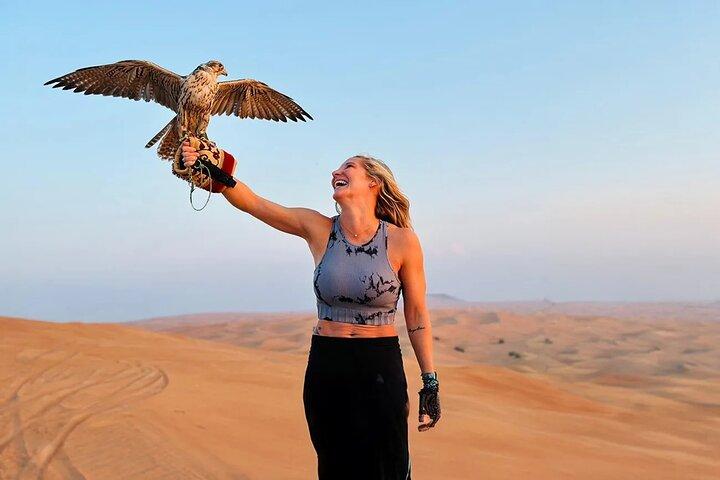 Private Red Dune Safari with BBQ, Camel Ride & Traditional Shows