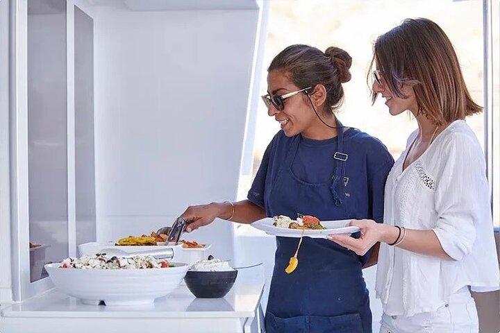 Santorini Gold Catamaran Cruise with BBQ, Drinks and Hotel Pickup