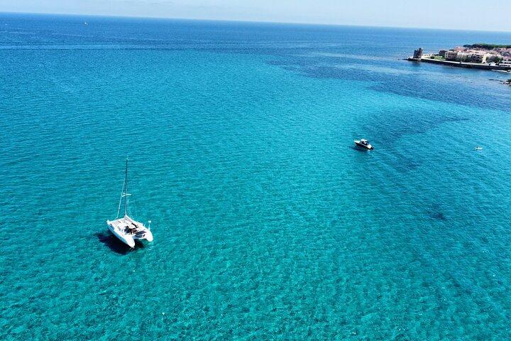 Catamaran Tour from La Caletta near Olbia – Experience Sardinia’s Coast