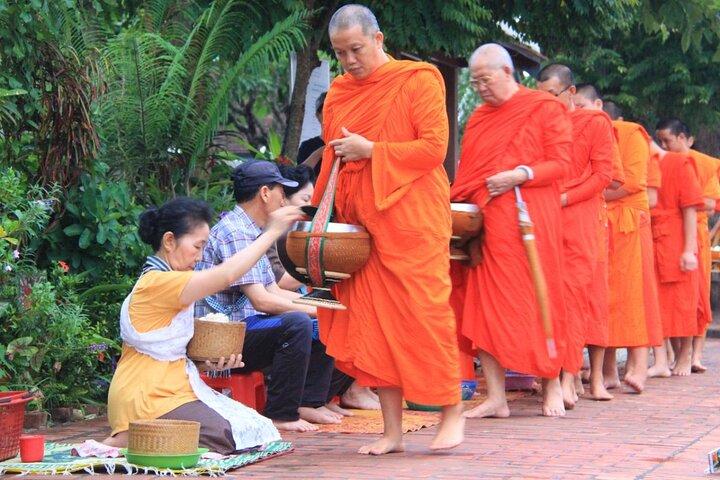 Luang Prabang Alm Giving, Temples and Pak Ou Caves Private Tour