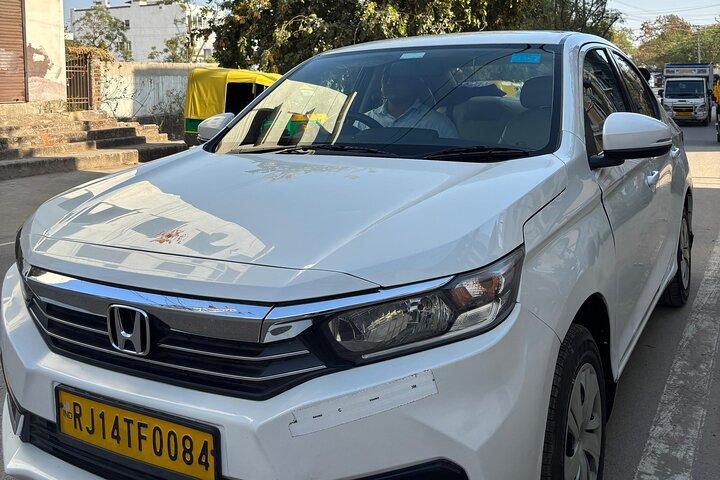 Udaipur Airport to Hotel One-Way Private Transfer in AC Vehicle
