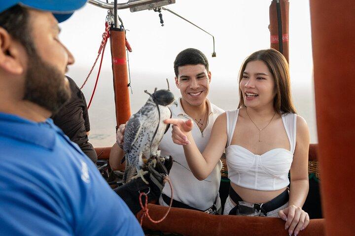 Luxury Sunrise Balloon Flight with Desert Breakfast and Falconry