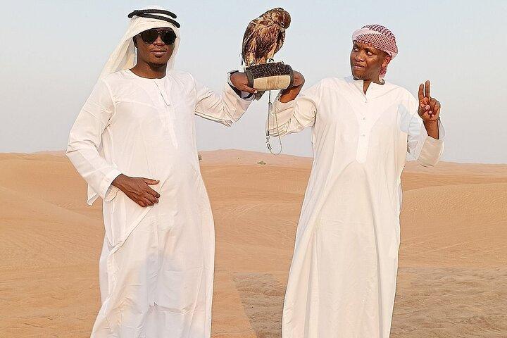 Evening Desert Safari Dubai: Red Dunes, Camel Ride, & BBQ Dinner