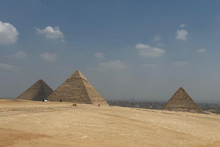 Giza Pyramids, Sphinx and Camel Ride Private Half-Day Tour