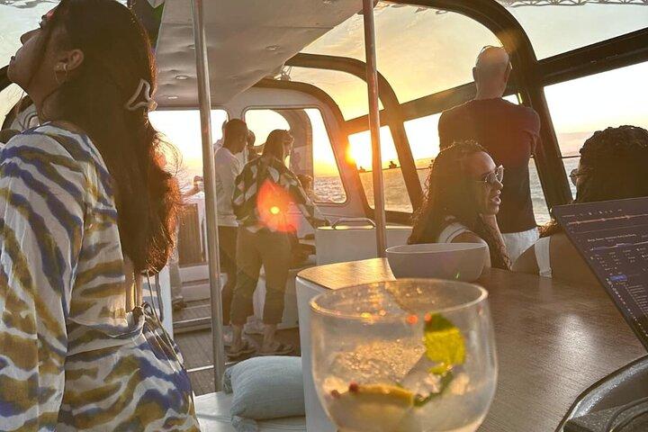 Lisbon Sunset DJ Party Cruise with Pizza & Drinks