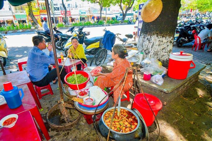 Hue Cyclo Night Adventure with Street Food and Folk Music Boat