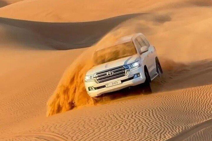 Dubai Desert Safari with Dune Bashing, Camel Ride and BBQ Dinner