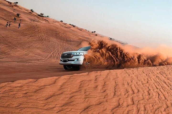Dubai Red Dune Desert Safari with Quad, Camel & Live Show