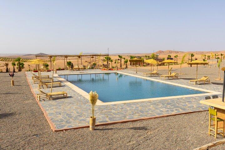 Agafay Desert Night Pass Dinner Show and Camel Ride Experience