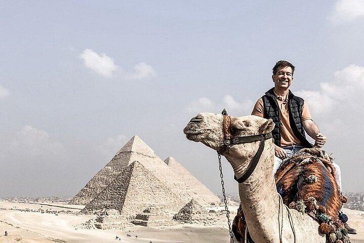 All inclusive,Giza Pyramids camel ride,lunch,&inside pyramids