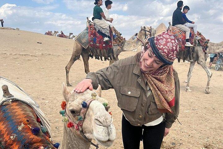 All inclusive,Giza Pyramids camel ride,lunch,&inside pyramids