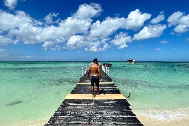 Holbox Island Trip with Boat Ride Biking and Swimming from Cancun
