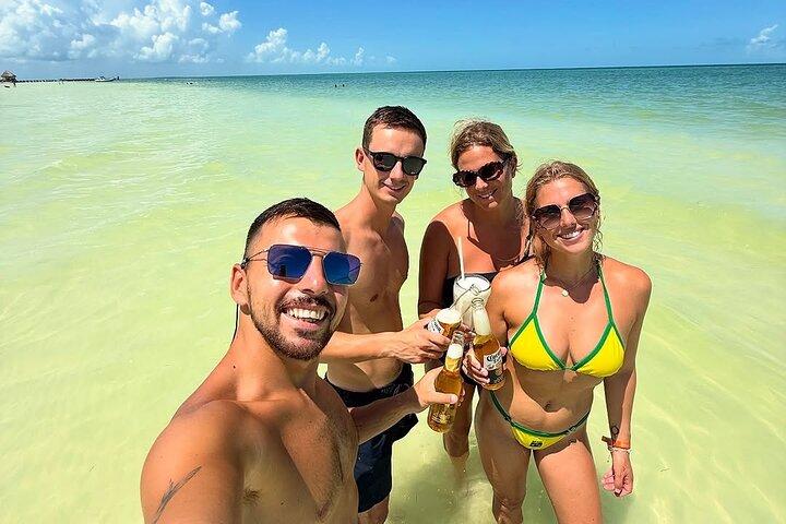 Holbox Island Trip with Boat Ride Biking and Swimming from Cancun