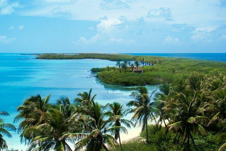 Contoy Island & Mujeres island, snorkeling & lunch on the beach.