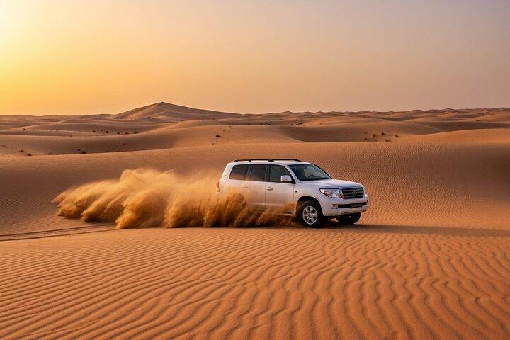 Dubai Desert Safari with Quad Bike Camel Ride Dinner and Shows