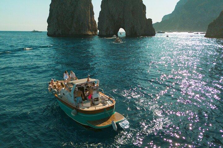 Day to Night Capri Boat Tour with Swim, Snorkel & Aperitif
