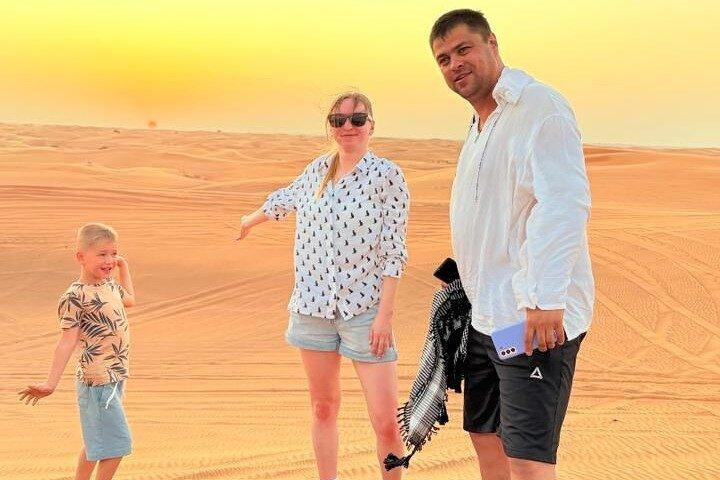Abu Dhabi Dune Bashing, Sand Surfing, Camel Ride, and BBQ Dinner