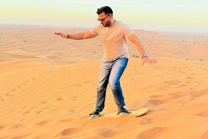 Abu Dhabi Dune Bashing, Sand Surfing, Camel Ride, and BBQ Dinner