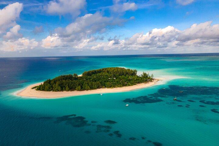Mnemba Island Full Day Dhow Snorkeling Trip with Drinks and Lunch