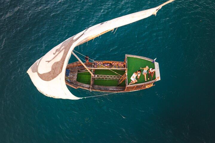 Mnemba Island Full Day Dhow Snorkeling Trip with Drinks and Lunch