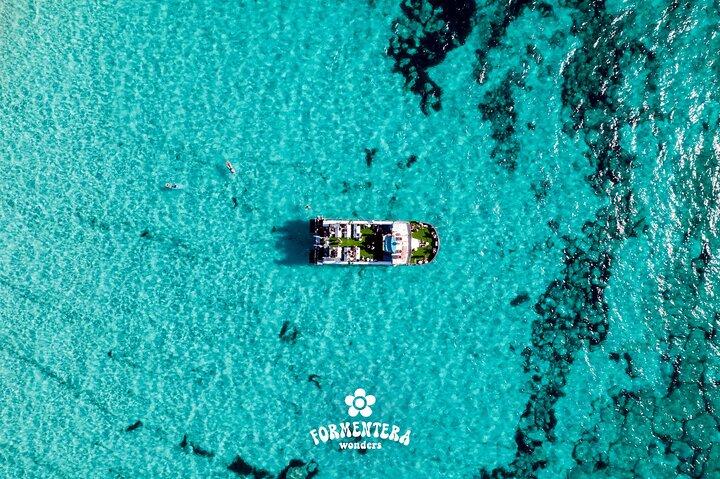Ibiza: Formentera Boat Trip with Open Bar, Paella & Sunset Party