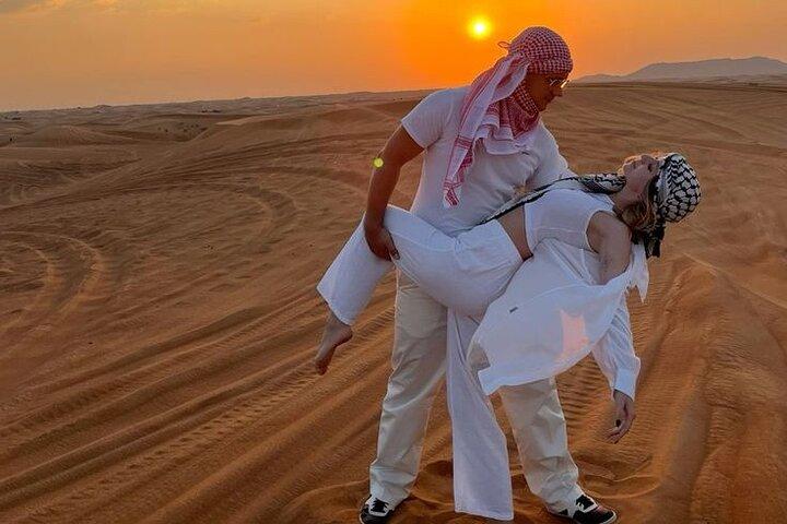 Dubai Red Dunes Desert Safari with Dinner, Camel, Shows & Pickup