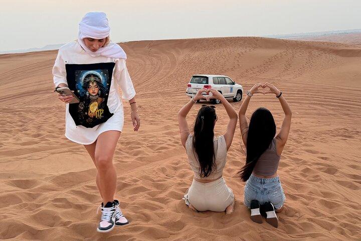 4 Hours Dubai Desert Experience: Camel + Sandboard + Falcon Photo