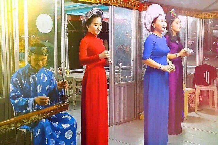 Cyclo Ride, Street Food, Folk Music on Perfume River Hue by Night