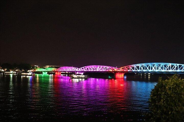Cyclo Ride, Street Food, Folk Music on Perfume River Hue by Night