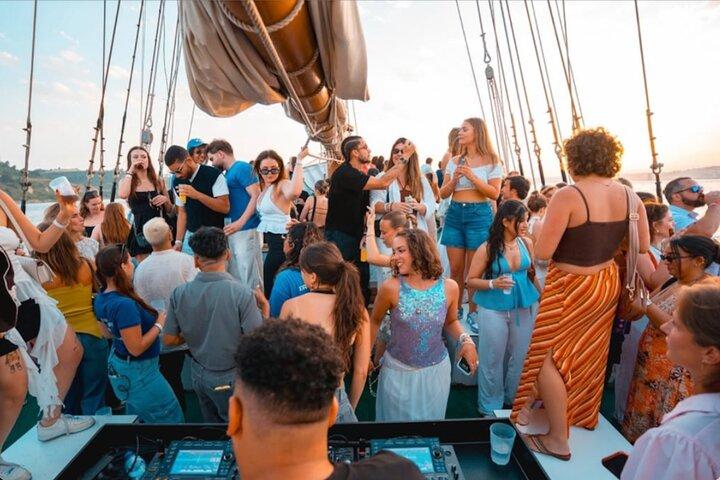 Lisbon Boat Party with Music, Drinks, and Stunning Views.