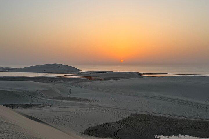 Doha Sunset Desert Safari with Dune Bashing & Camel Ride
