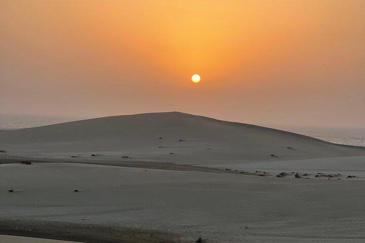 Doha Sunset Desert Safari with Dune Bashing & Camel Ride