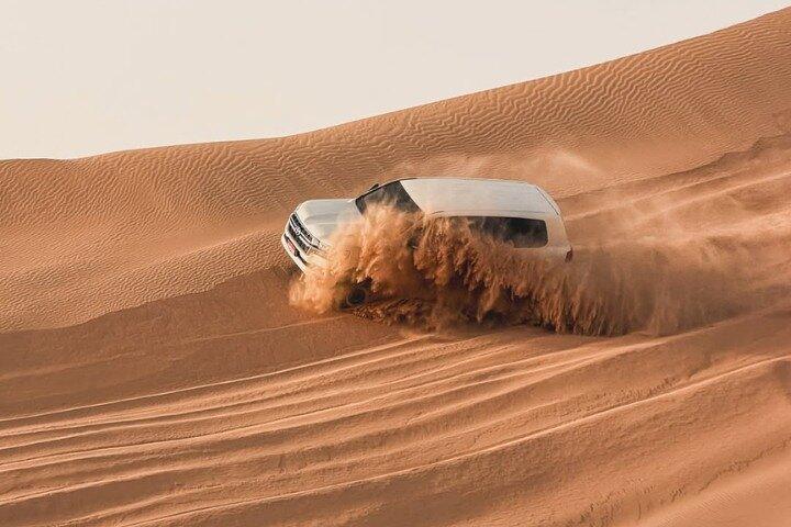 Dubai Desert Safari | Dune Bashing, Camel Ride & BBQ Dinner