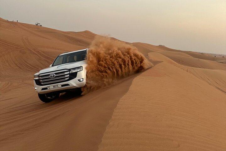 Explore Dubai Evening Safari with Quad bike, Camel & BBQ Dinner