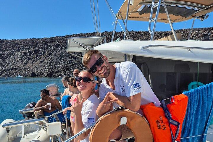 Luxury Santorini Catamaran Cruise: Lunch, BBQ, Drinks, Transfers