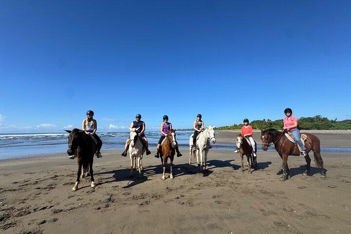Horseback riding through the beaches of Esterillos near Jaco