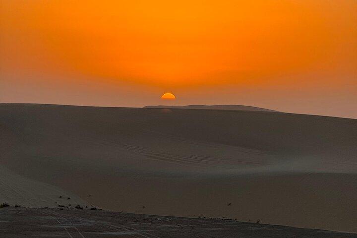 Doha Sunset Desert Safari with Dune Bashing & Camel Ride