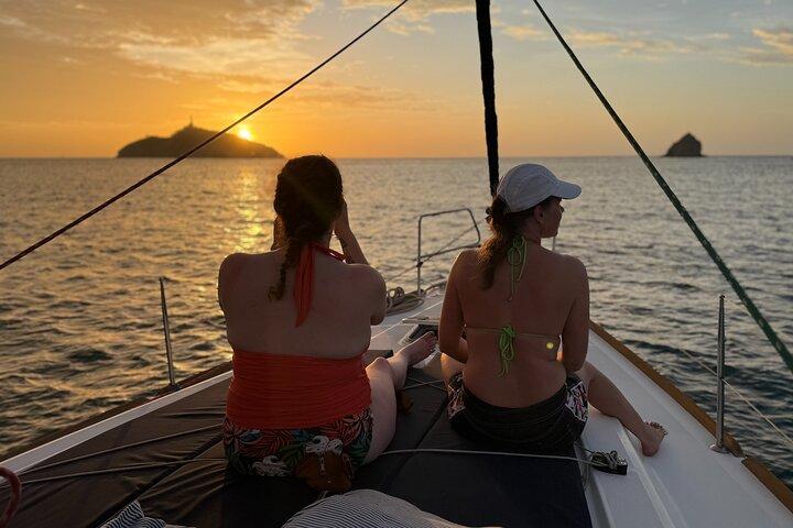 incredible Sunset on Sailboat by Bahí Santa Marta