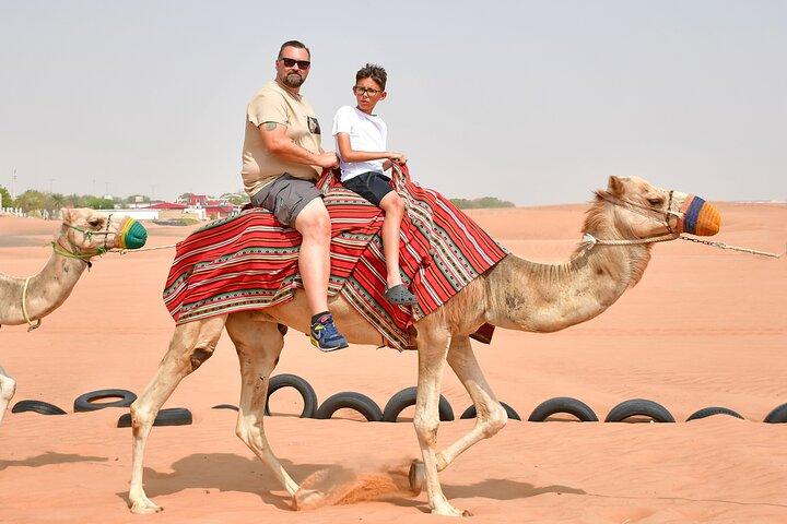 Desert Safari With BBQ Dinner,Quad Ride Falcon Photo Sandboarding